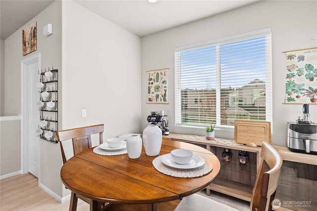 22916 SE Cherry St, Black Diamond, WA 98010 - dining area with light wood-style floors and baseboards