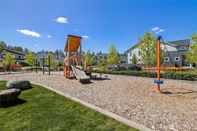 view of playground with a residential view