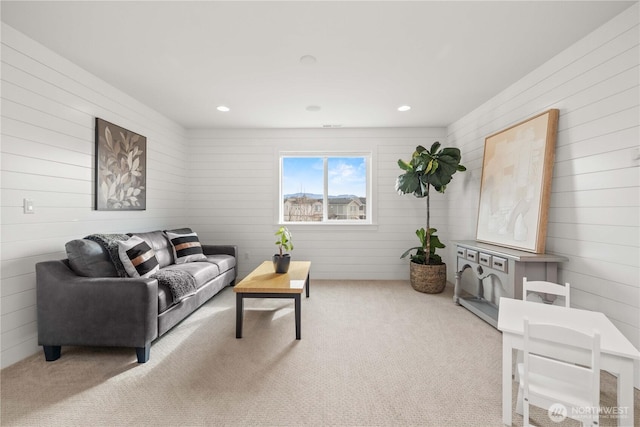 living room with carpet and recessed lighting