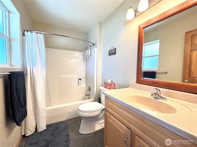 bathroom featuring shower / bath combo, vanity, toilet, and tile patterned floors
