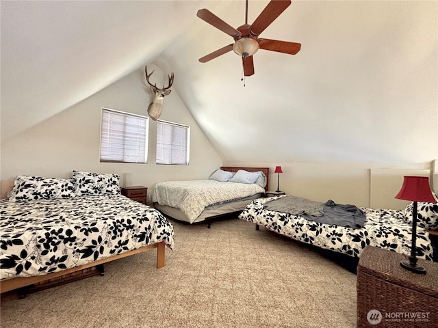 bedroom with lofted ceiling, carpet floors, and ceiling fan