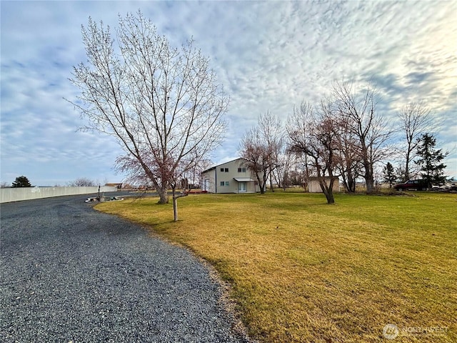 exterior space featuring a front lawn