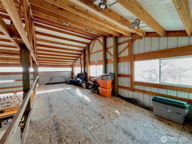 interior space with lofted ceiling and a garage