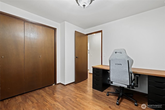 office area featuring wood finished floors and baseboards