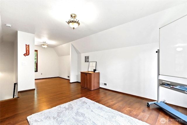 bonus room with lofted ceiling, visible vents, and wood finished floors