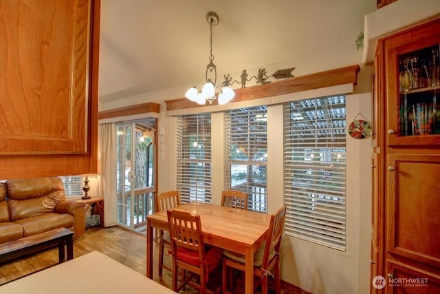 dining area featuring a chandelier