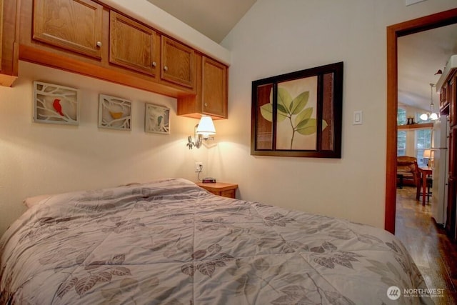 bedroom featuring lofted ceiling