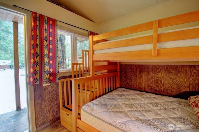 bedroom with lofted ceiling