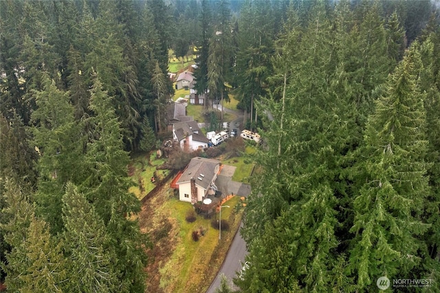 aerial view featuring a forest view