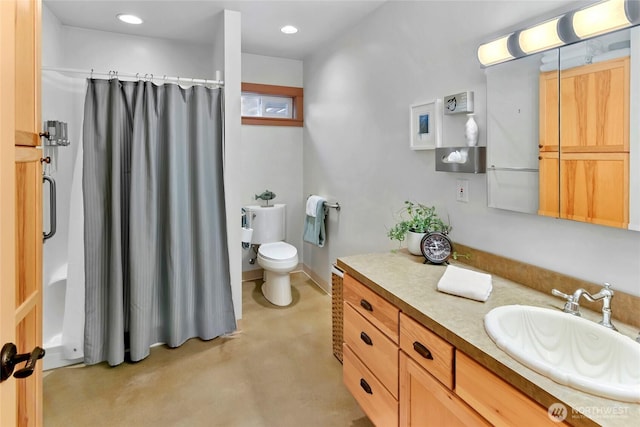 full bath with recessed lighting, vanity, toilet, and finished concrete flooring