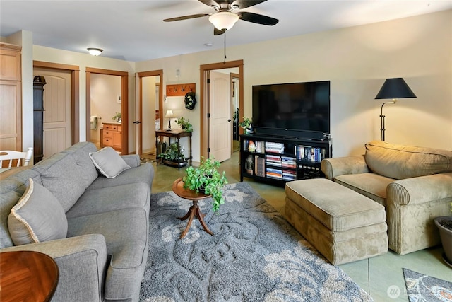 living room featuring a ceiling fan