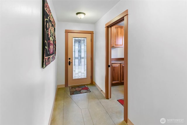 doorway with baseboards