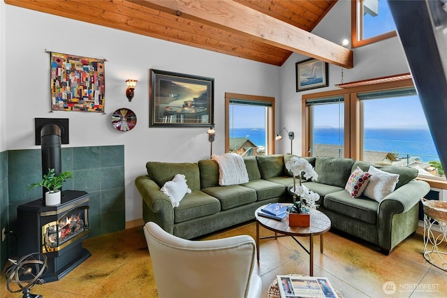 living room featuring wood ceiling, a water view, lofted ceiling with beams, and a wood stove