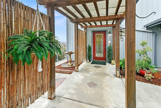 doorway to property with fence