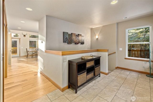 kitchen featuring light wood-style floors, recessed lighting, and baseboards