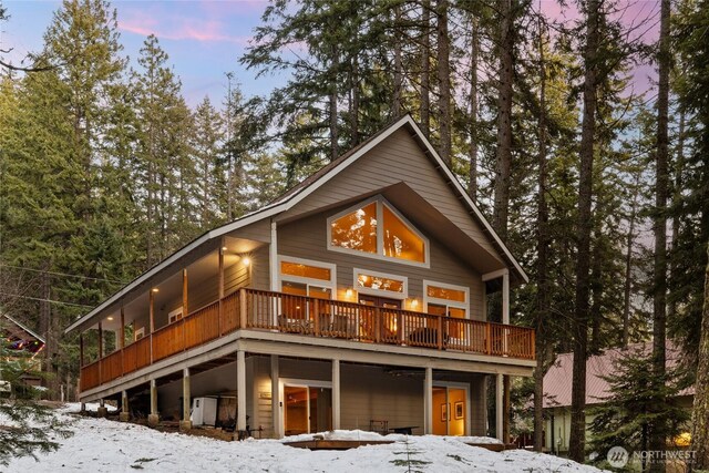 view of front of property featuring a wooden deck