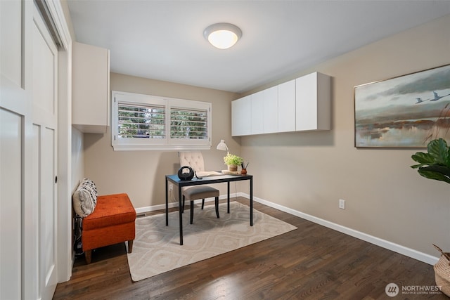 office space featuring baseboards and dark wood-style flooring