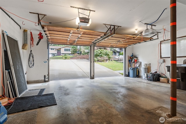 garage featuring a garage door opener