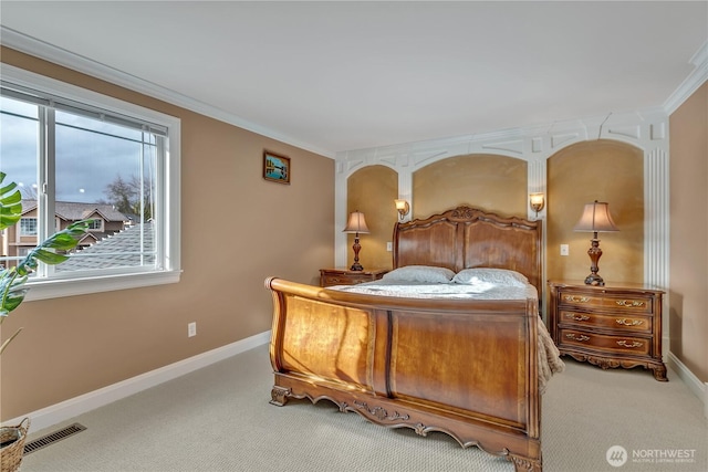 bedroom with carpet floors, visible vents, ornamental molding, and baseboards