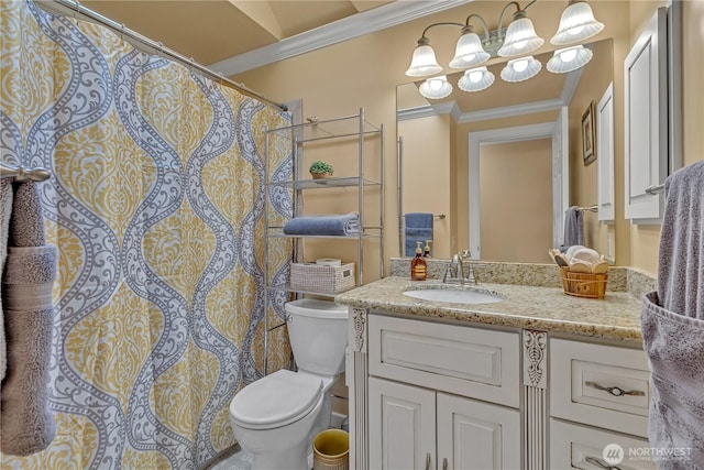 full bath featuring toilet, ornamental molding, and vanity