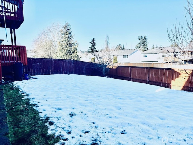 view of yard with a fenced backyard