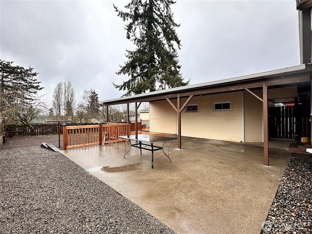 view of patio / terrace with fence and a wooden deck