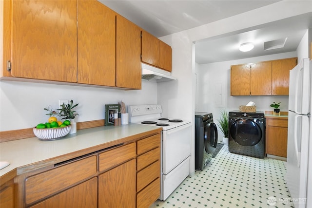 kitchen featuring white appliances, light floors, independent washer and dryer, light countertops, and under cabinet range hood