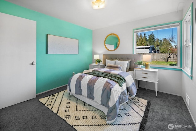 bedroom featuring carpet, visible vents, and baseboards