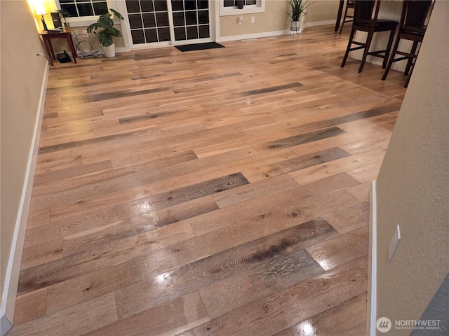 room details featuring wood finished floors and baseboards