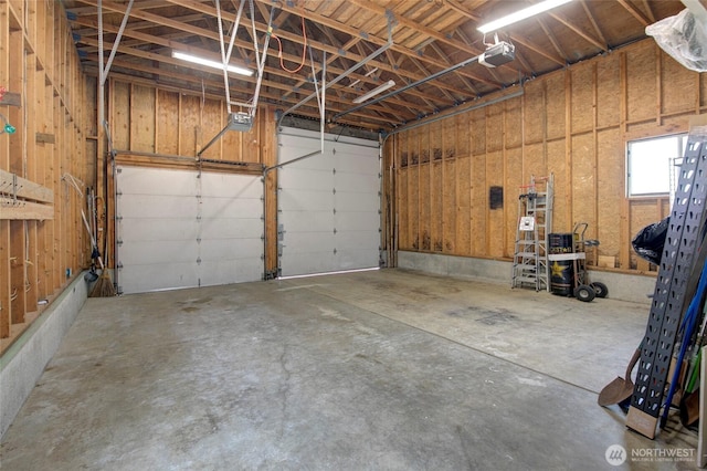 garage featuring a garage door opener