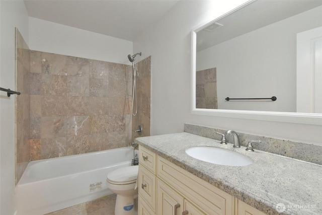 bathroom featuring shower / washtub combination, vanity, and toilet