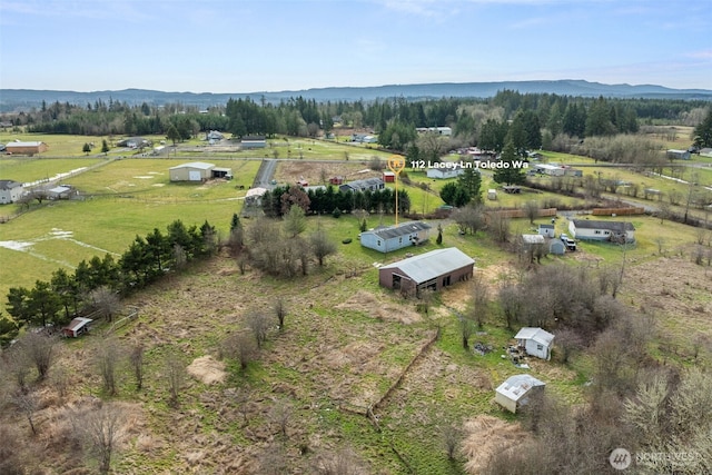 aerial view with a rural view and a mountain view