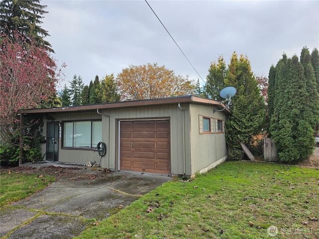 garage featuring driveway