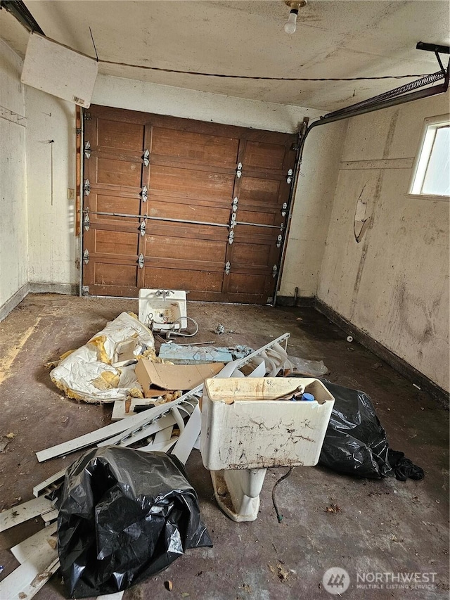 garage featuring baseboards