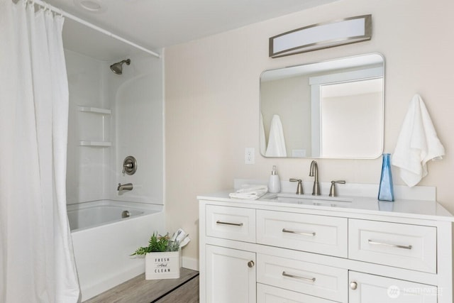 full bath featuring vanity and shower / bathtub combination with curtain