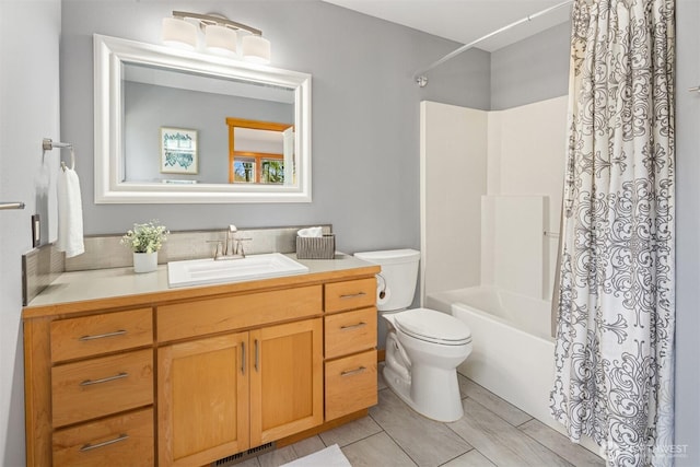 full bath with visible vents, vanity, toilet, and shower / tub combo with curtain