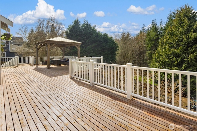 wooden terrace with a gazebo