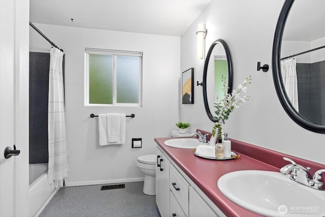 full bathroom with toilet, visible vents, a sink, and baseboards