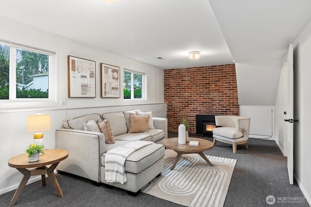 living room with carpet flooring and visible vents