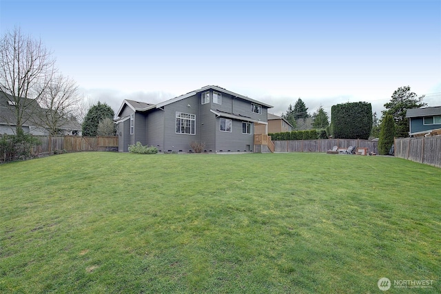 view of yard featuring a fenced backyard