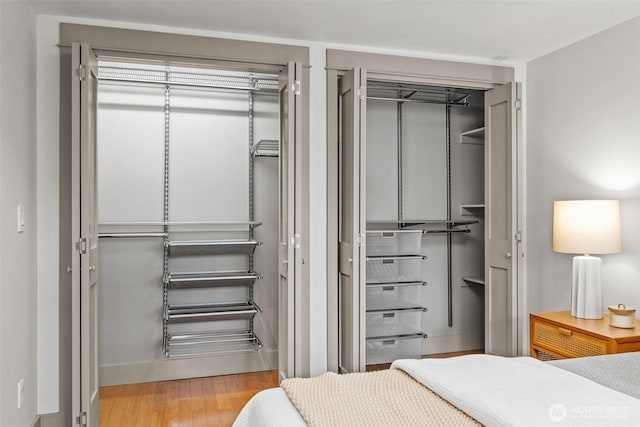 bedroom featuring light wood-style floors