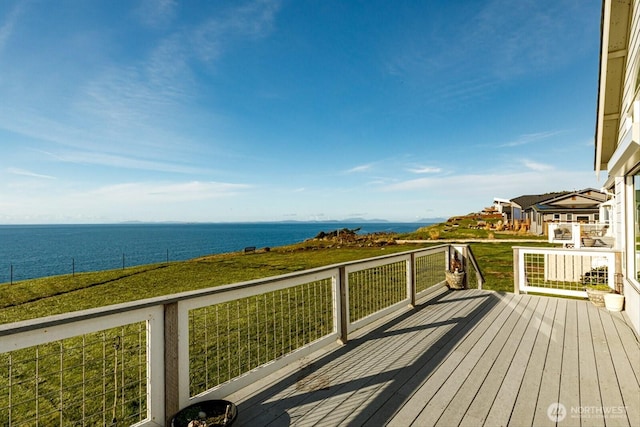 deck featuring a water view