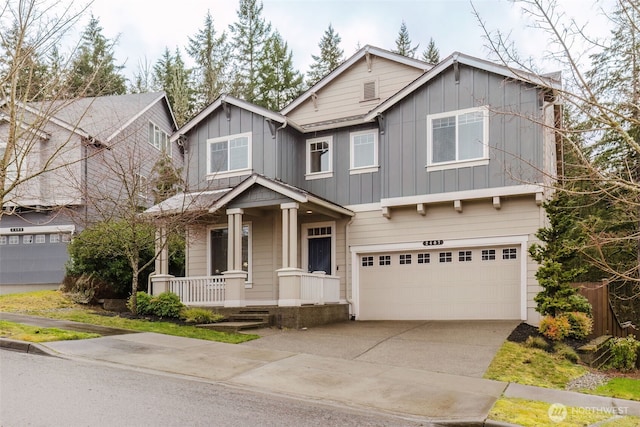 view of front of property with an attached garage, a porch, board and batten siding, and concrete driveway