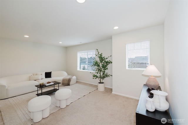 living area with carpet floors, recessed lighting, and baseboards