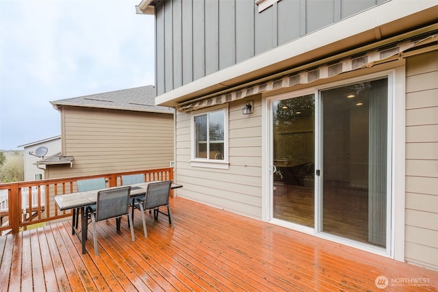 deck with outdoor dining space