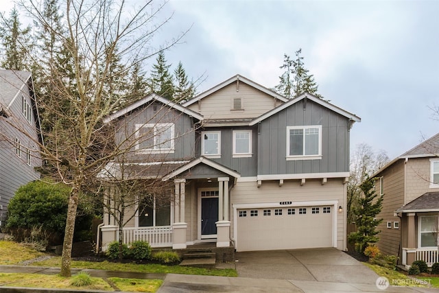 craftsman house featuring a garage, concrete driveway, a porch, and board and batten siding