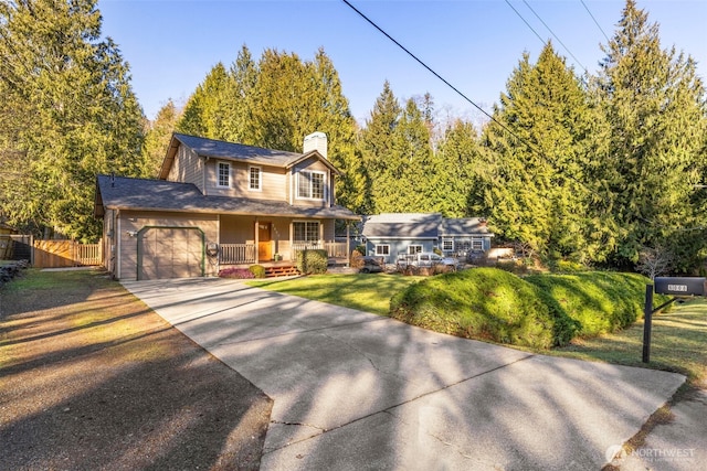 view of front of home featuring an attached garage, covered porch, fence, driveway, and a chimney