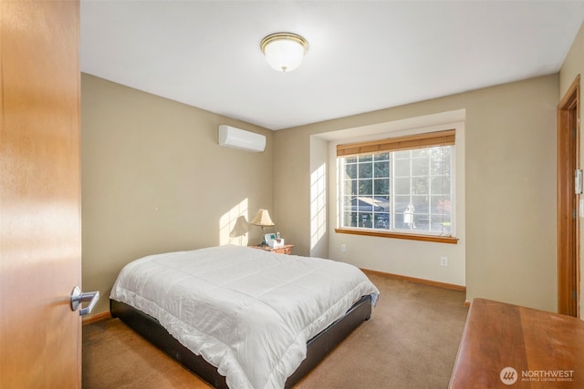 bedroom featuring baseboards, an AC wall unit, and carpet flooring