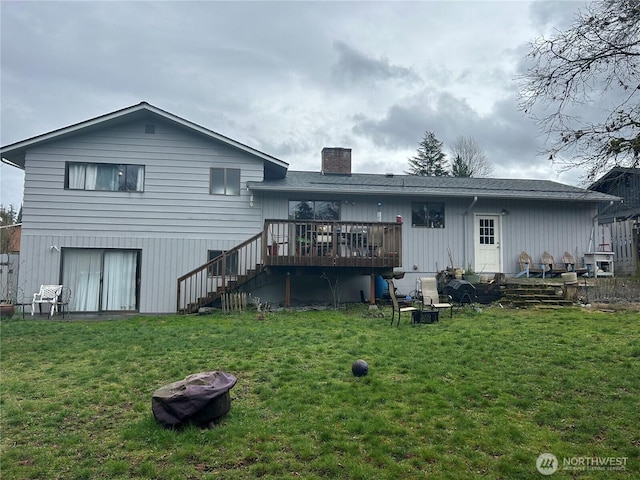 2109 Ontario St, Bellingham, WA 98229 - rear view of house with a chimney, stairs, a wooden deck, and a lawn