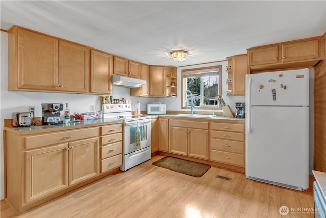 kitchen featuring white appliances, under cabinet range hood, open shelves, and light brown cabinetry